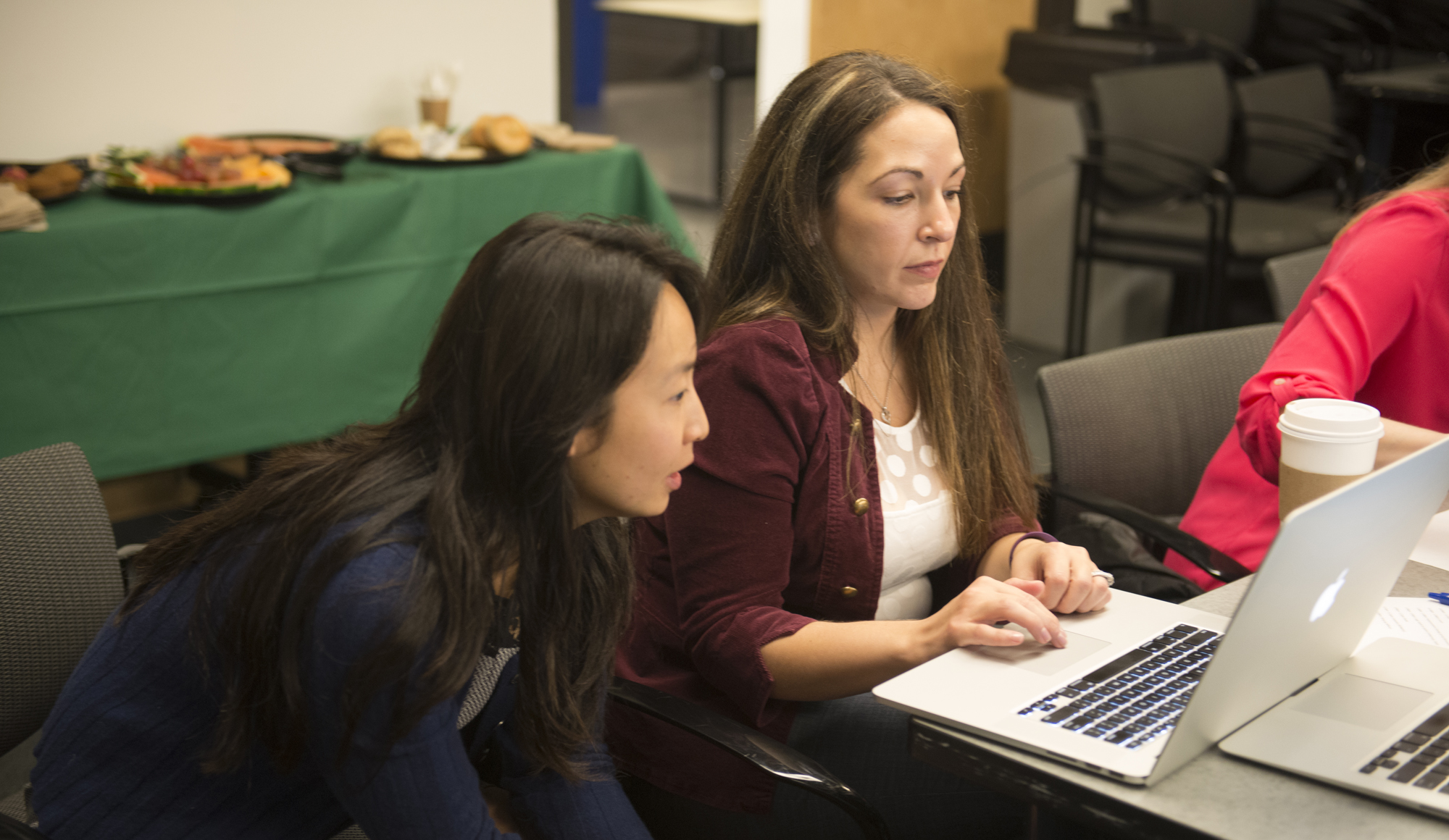 Project manager working with faculty